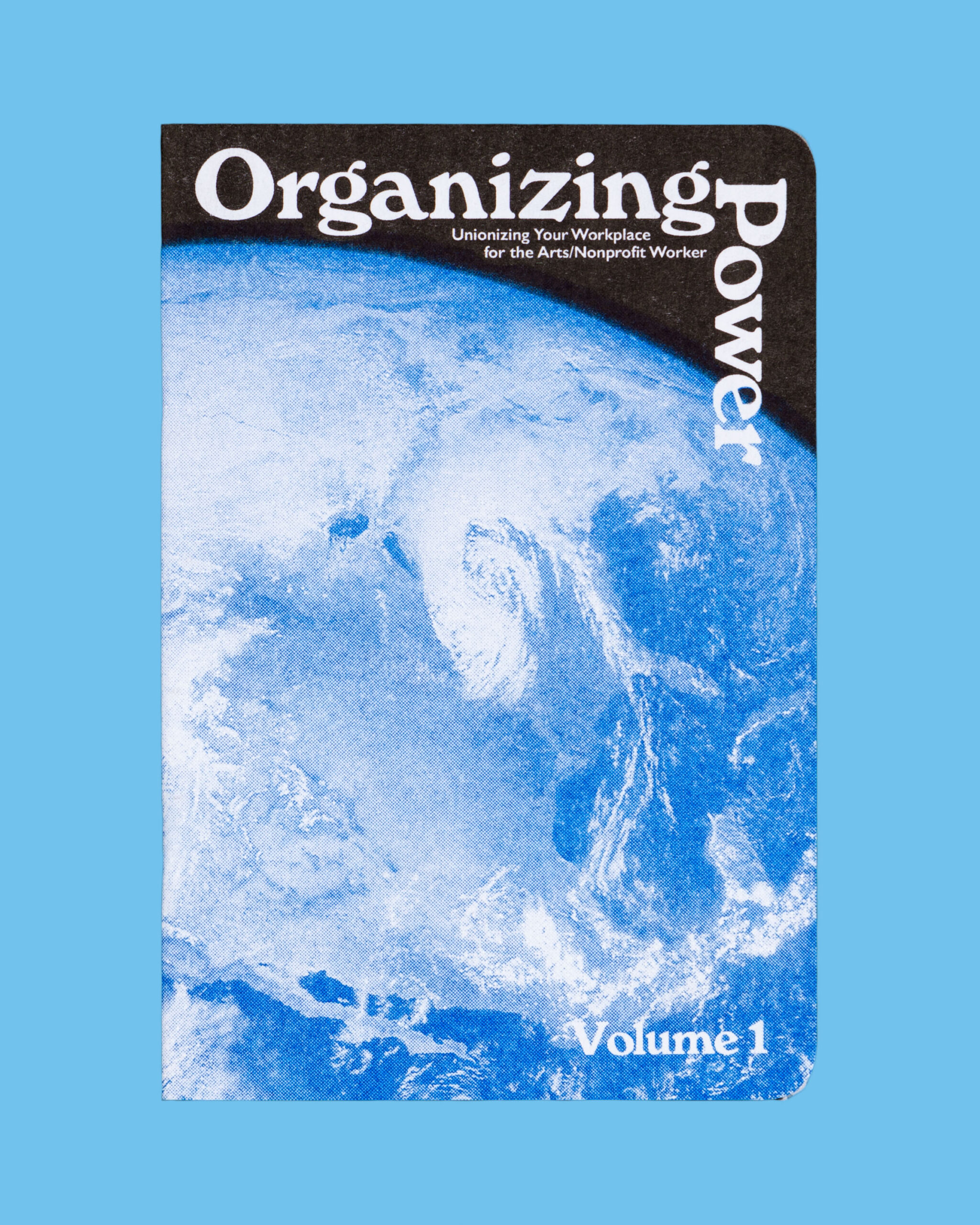 Cover of Organizing Power, Volume 1: Unionizing Your Workplace for the Arts/Nonprofit Worker, featuring a blue-and-white satellite image of Earth beneath a black title band.